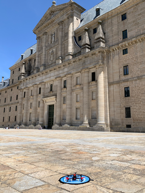 Quadrotor drone ready to take off, for an inspection on the main facade of the Monastery of El Escorial, Spain (photo by the author)
